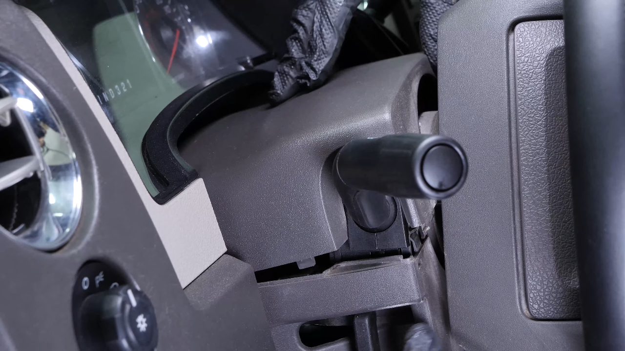 Put the lower steering column cover back