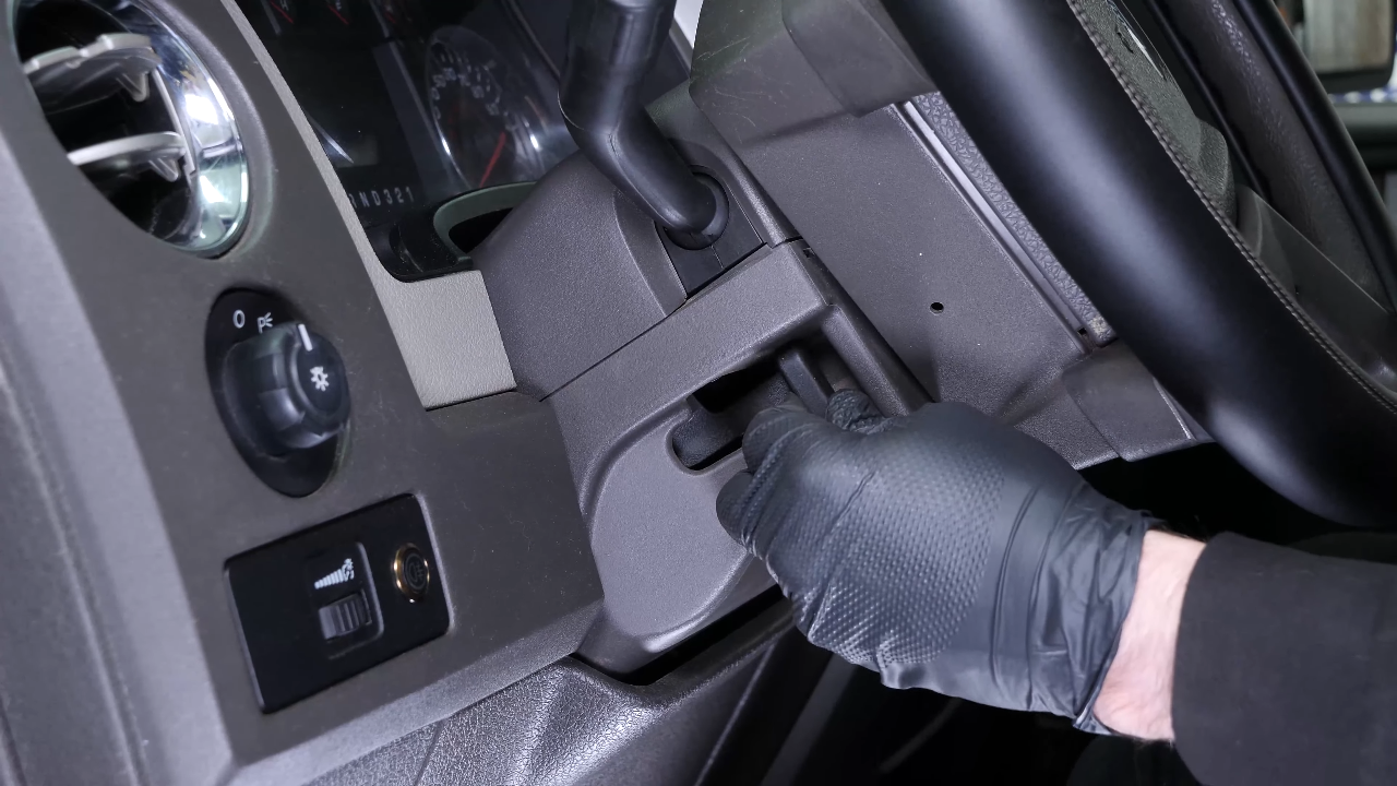 Put the lower steering column cover back