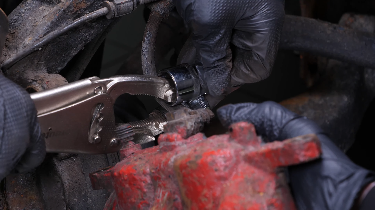 Remove the brake caliper