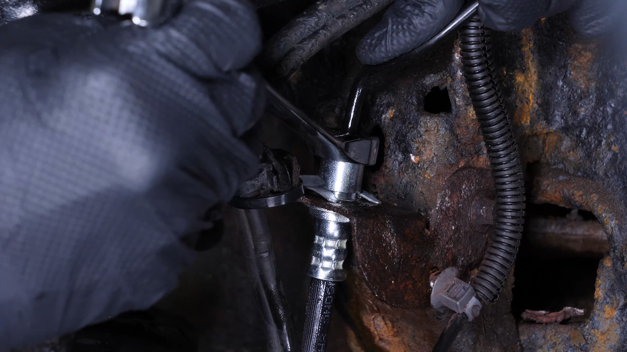 Remove the brake caliper