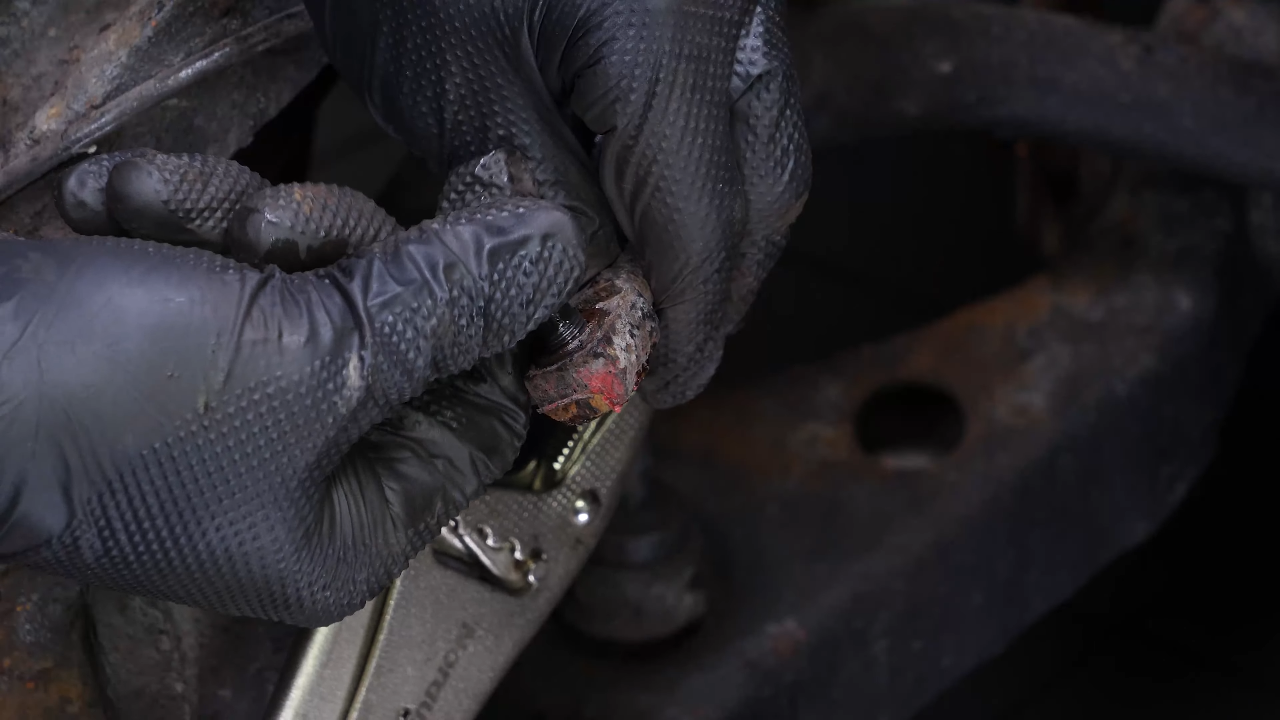 Remove the brake caliper