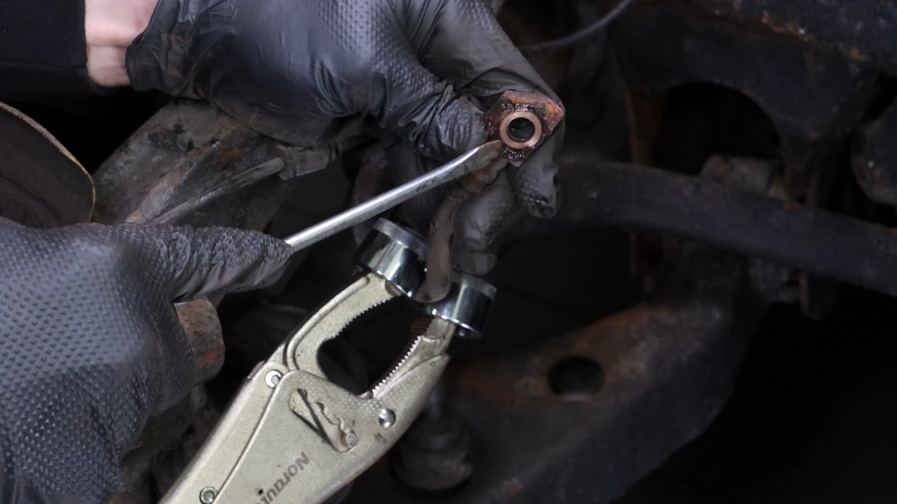 Remove the brake caliper