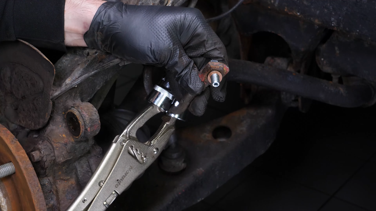 Put the new brake caliper back