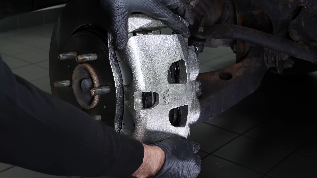 Replace the brake caliper