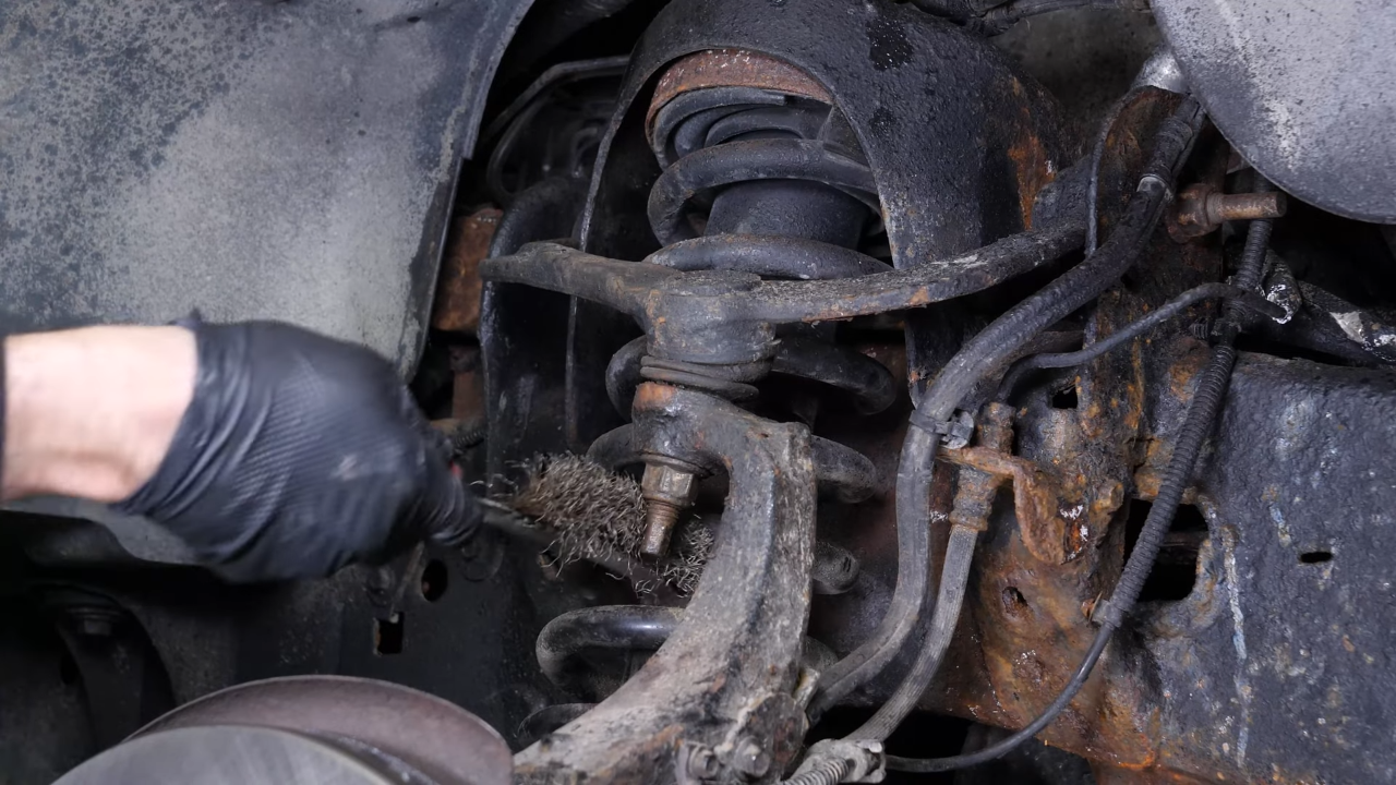 Remove the control arm ball joint