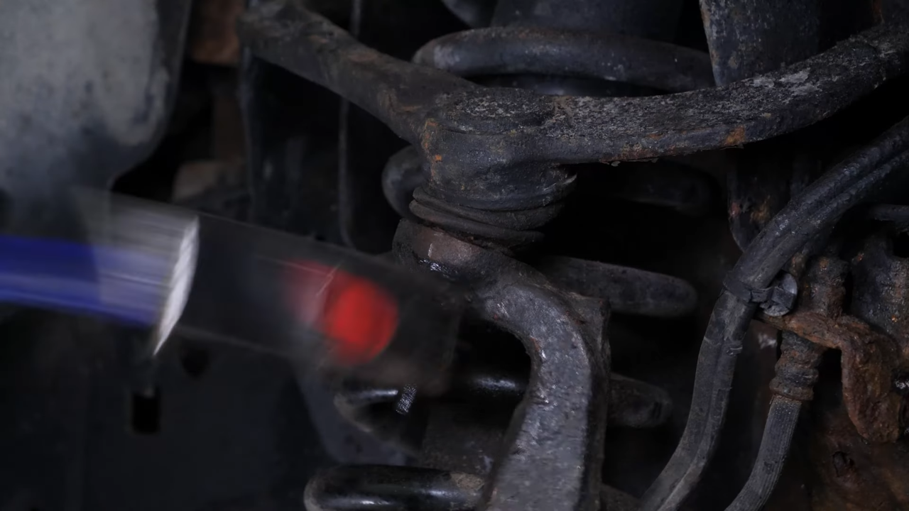 Remove the control arm ball joint