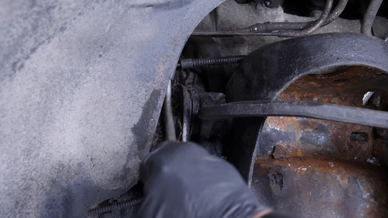 Remove the upper control arm