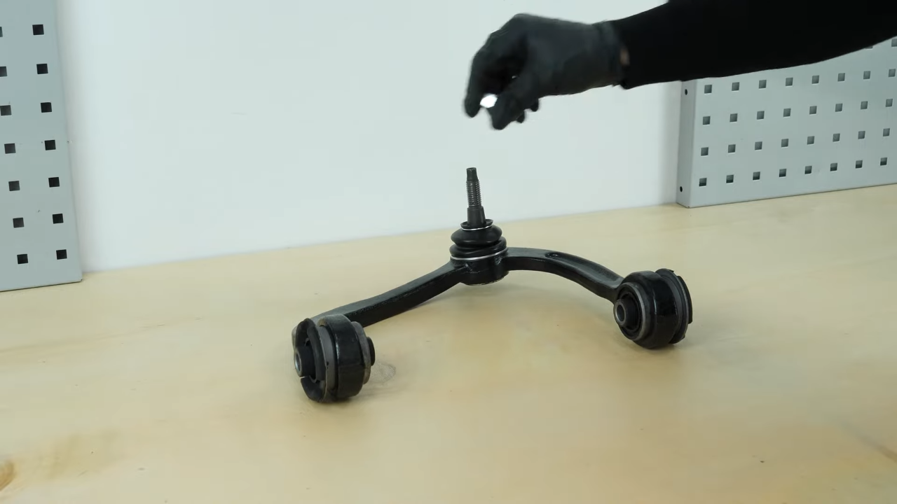 Prepare the new control arm