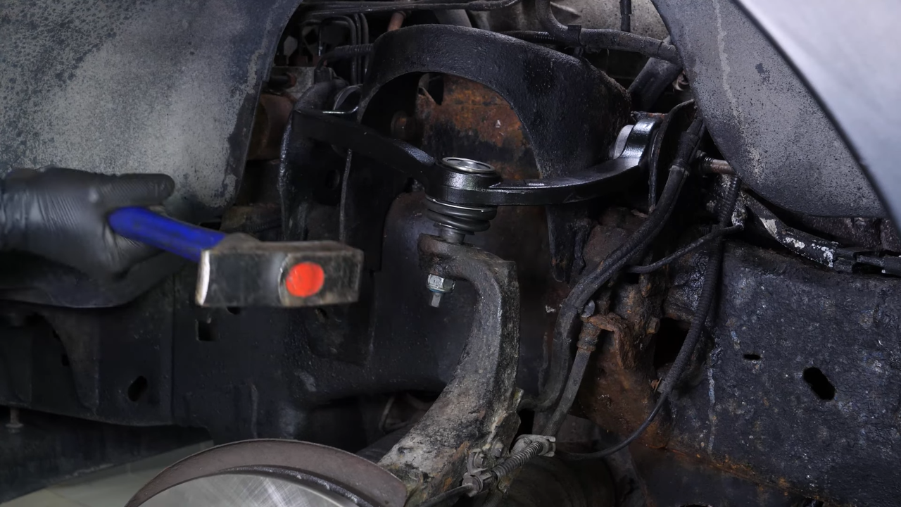 Install the new upper control arm