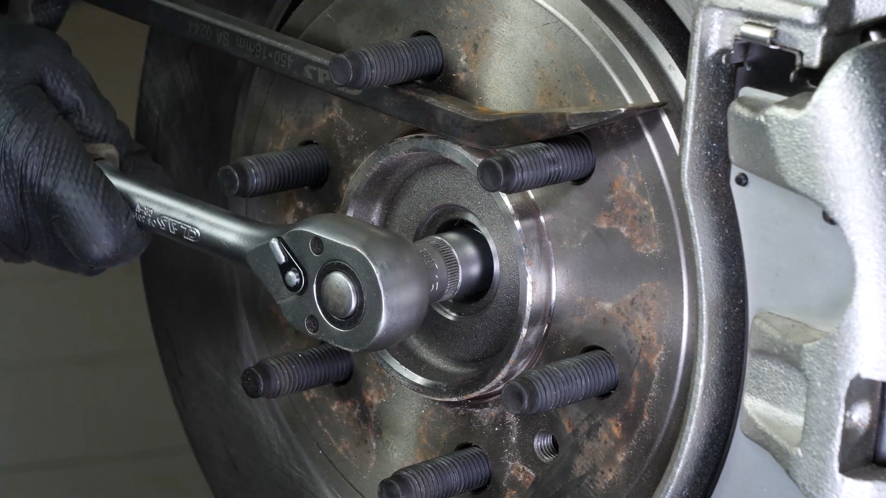 Unscrew the CV axle nut
