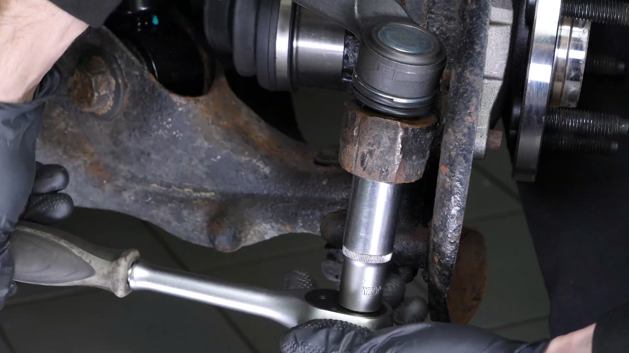 Remove the outer tie rod