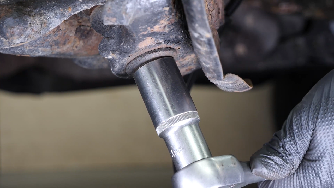 Remove the control arm ball joint