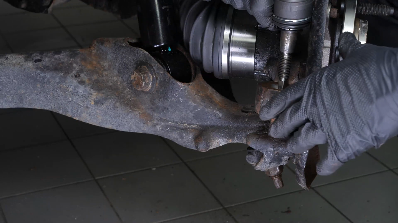 Remove the control arm ball joint