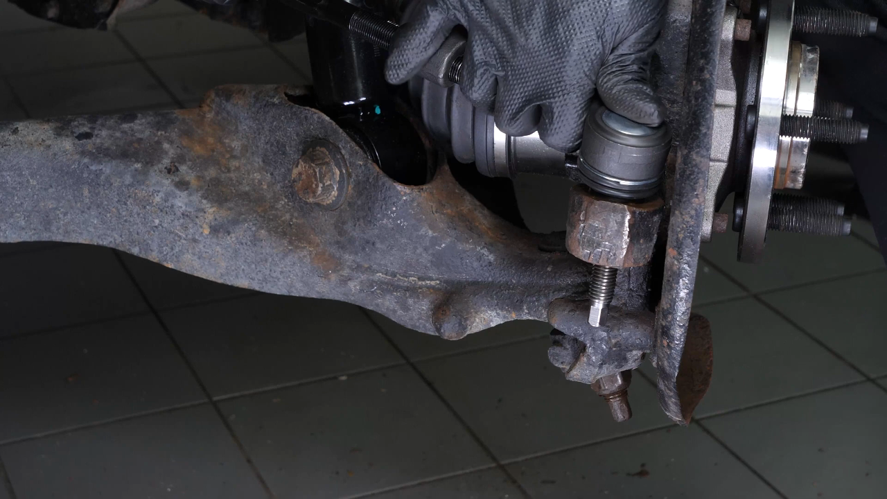 Remove the control arm ball joint