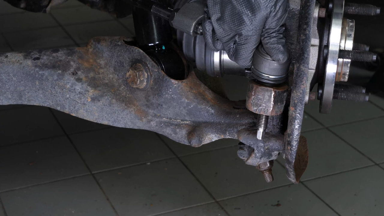 Remove the control arm ball joint