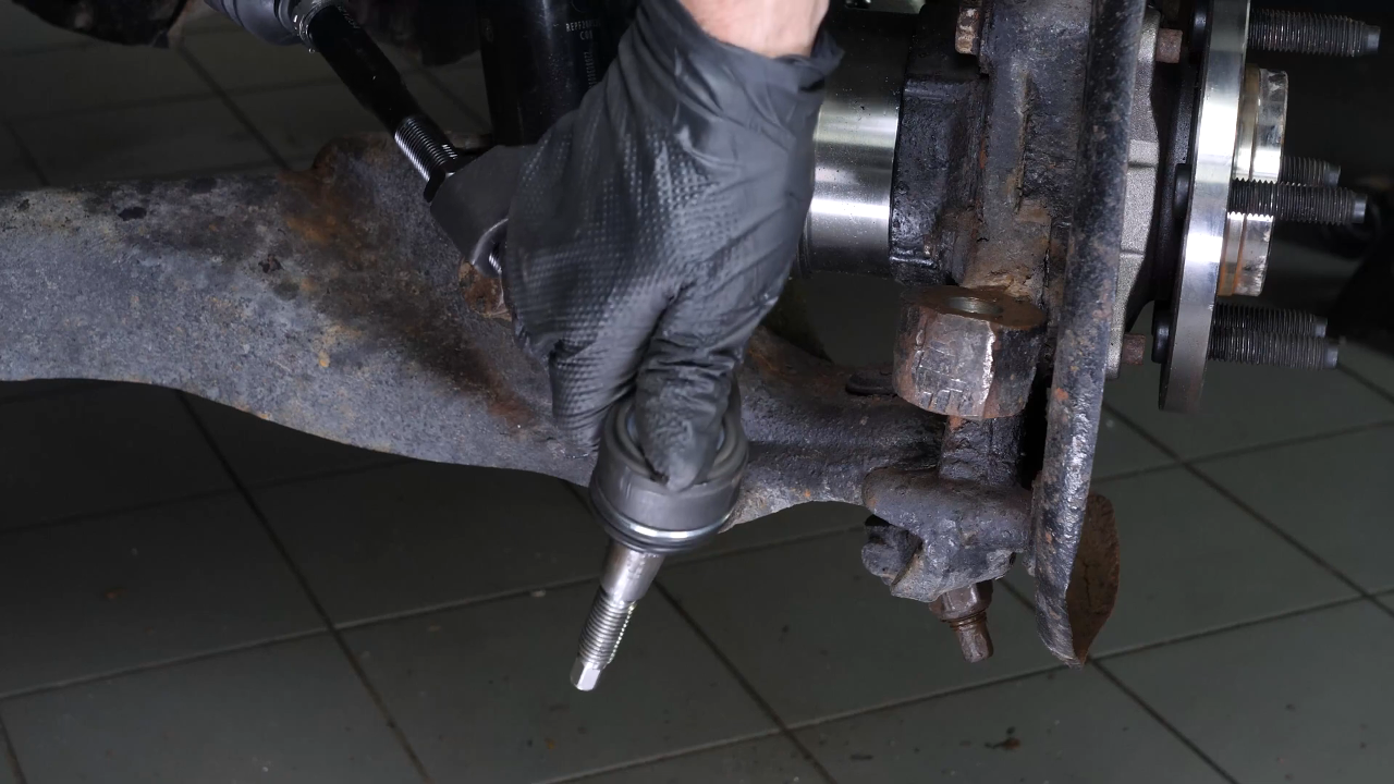 Remove the control arm ball joint