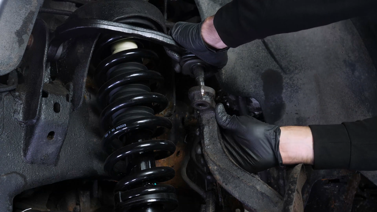 Remove the control arm ball joint