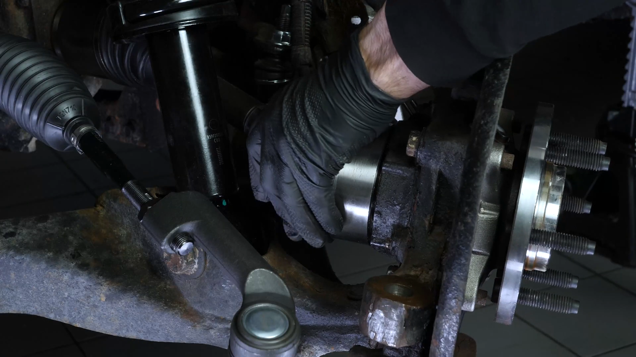 Remove the control arm ball joint