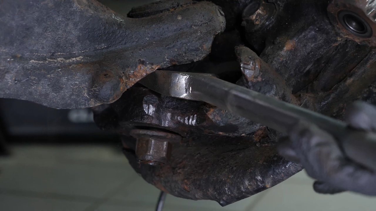 Remove the control arm ball joint