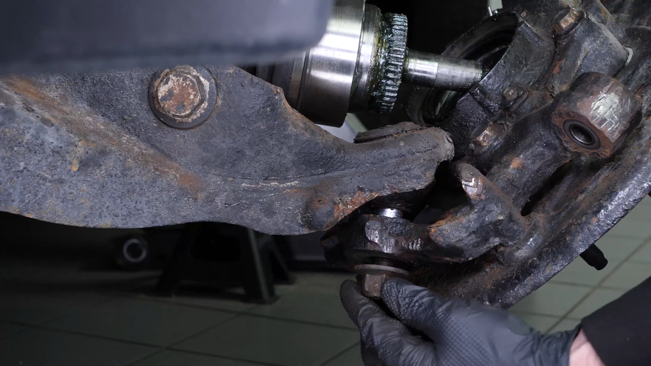 Remove the control arm ball joint