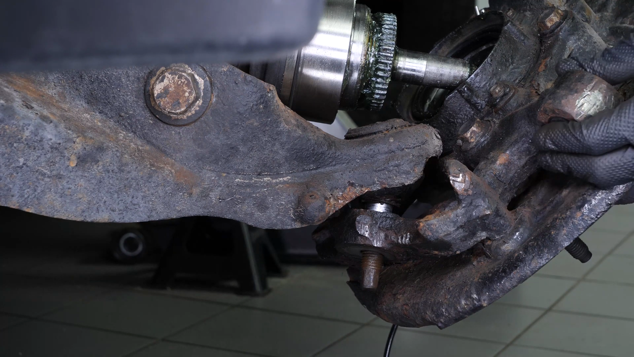 Remove the control arm ball joint
