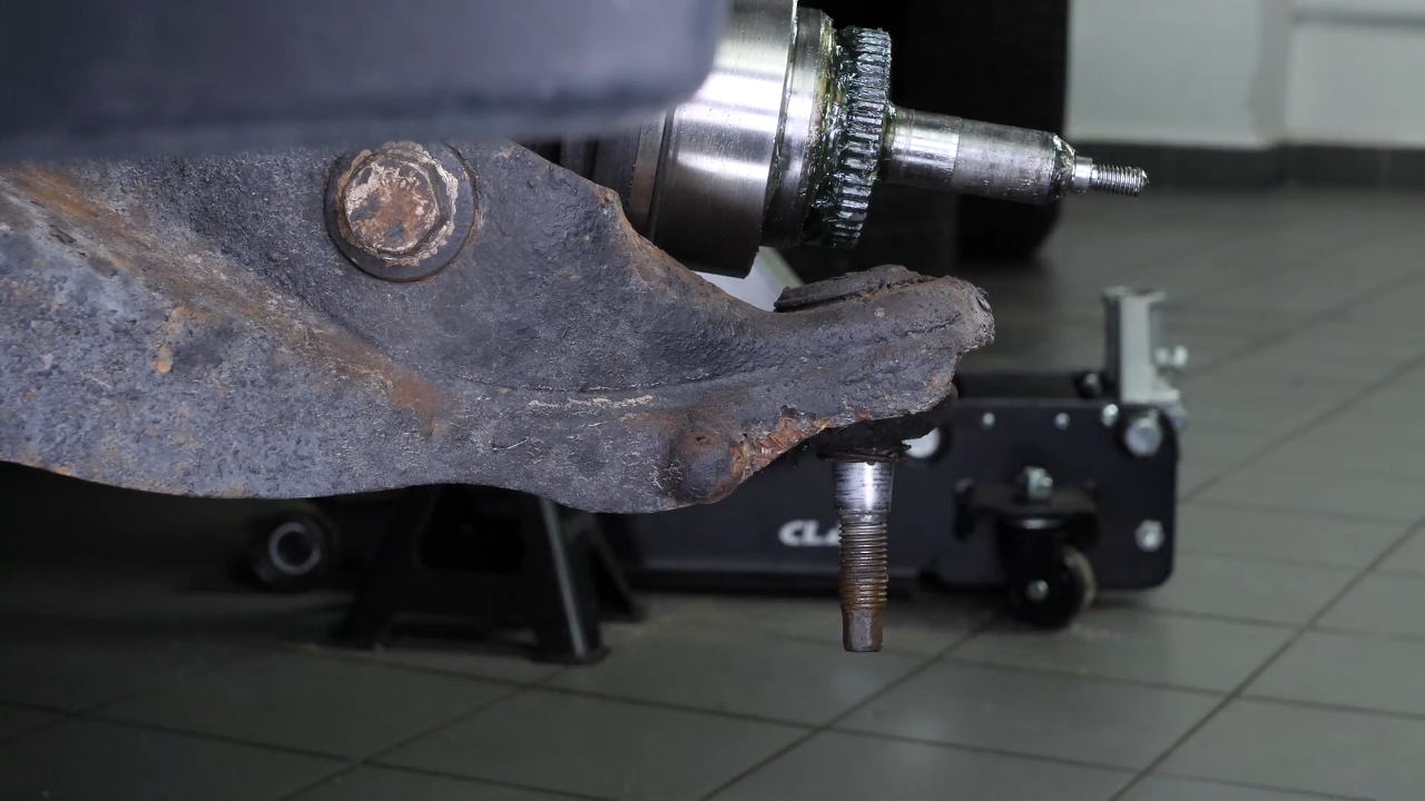 Remove the control arm ball joint