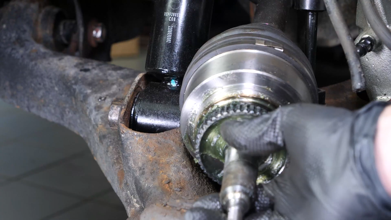 Remove the control arm ball joint