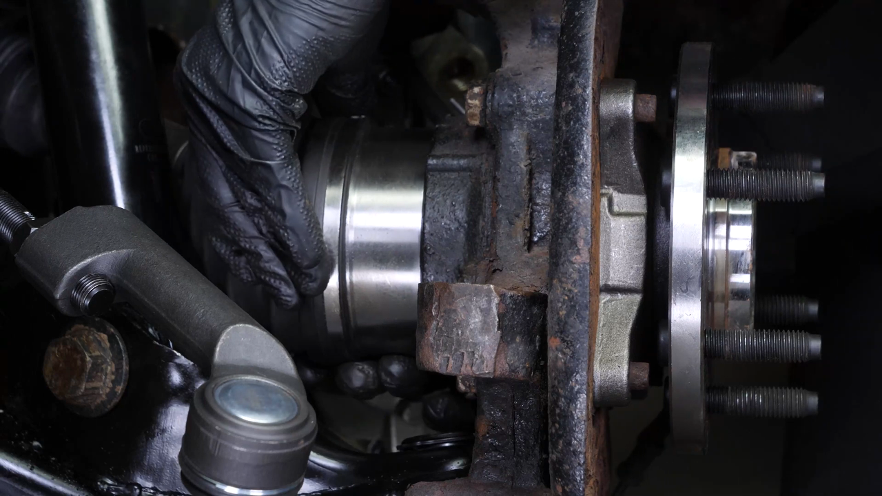 Put the outer tie rod back