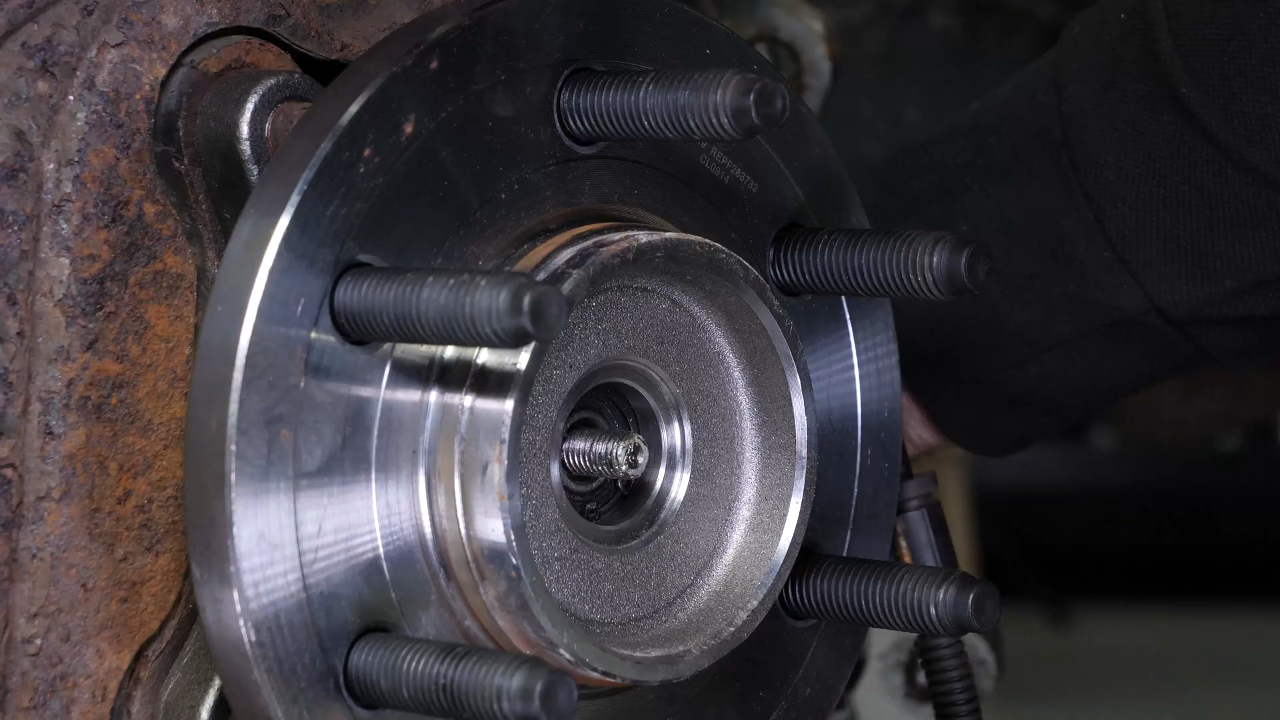 Put the outer tie rod back