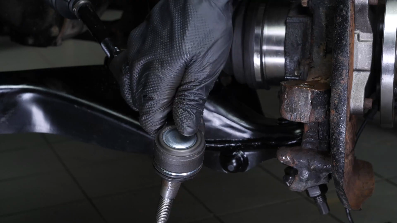 Put the outer tie rod back