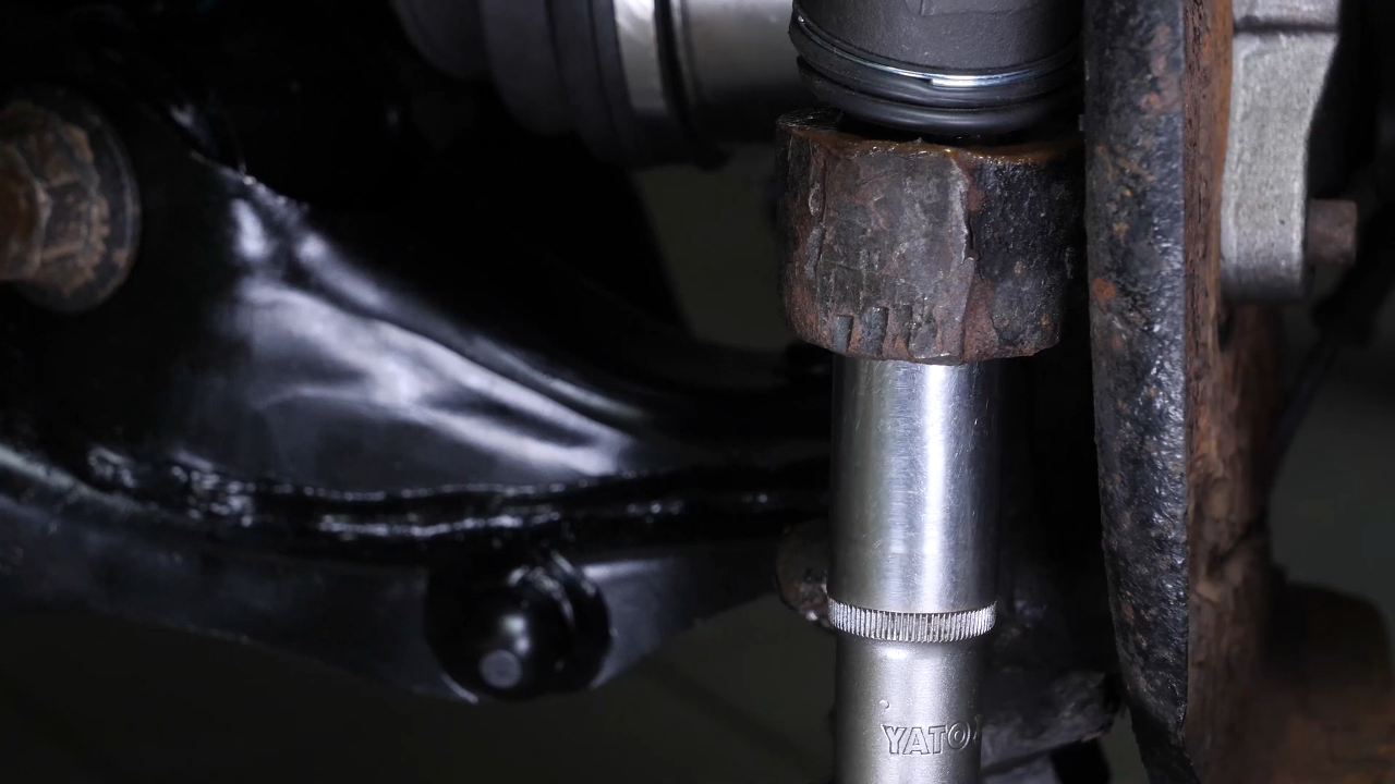 Put the outer tie rod back