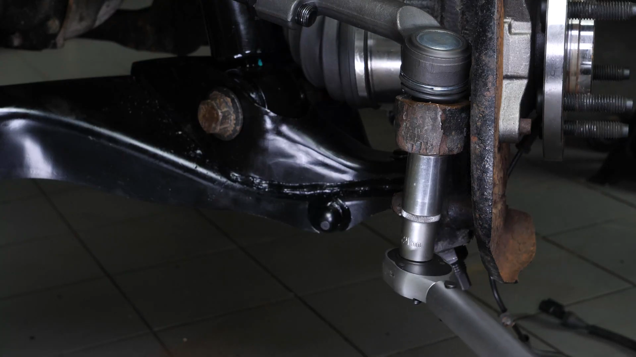 Put the outer tie rod back