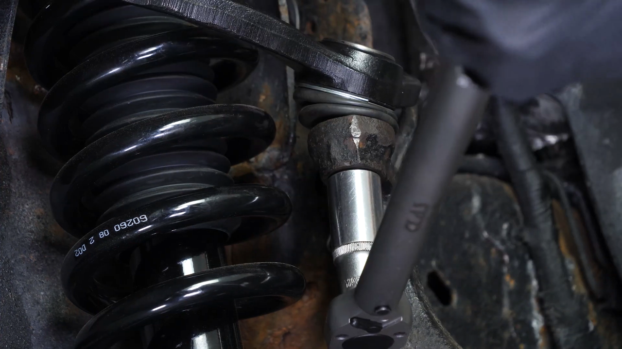 Put the outer tie rod back