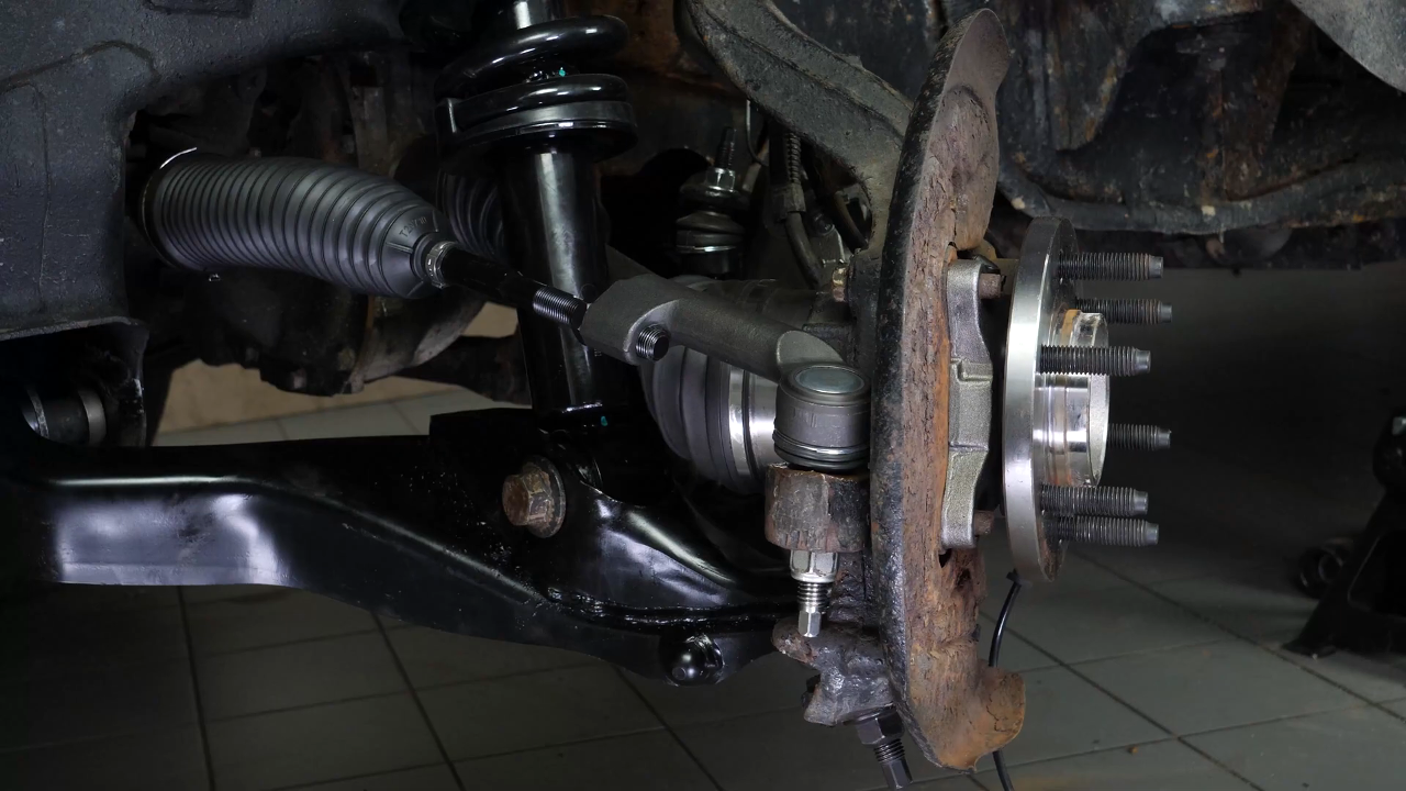 Put the outer tie rod back