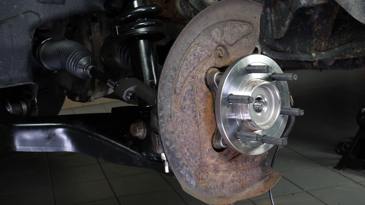 Put the outer tie rod back