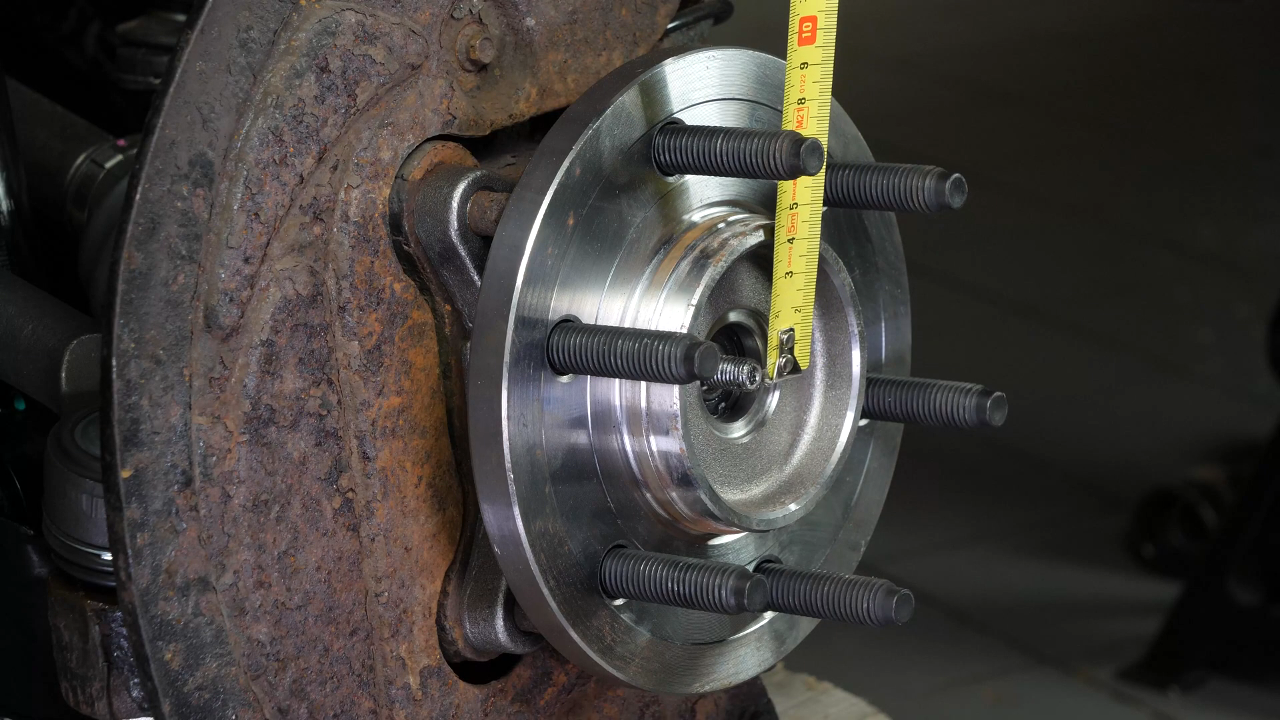 Put the outer tie rod back