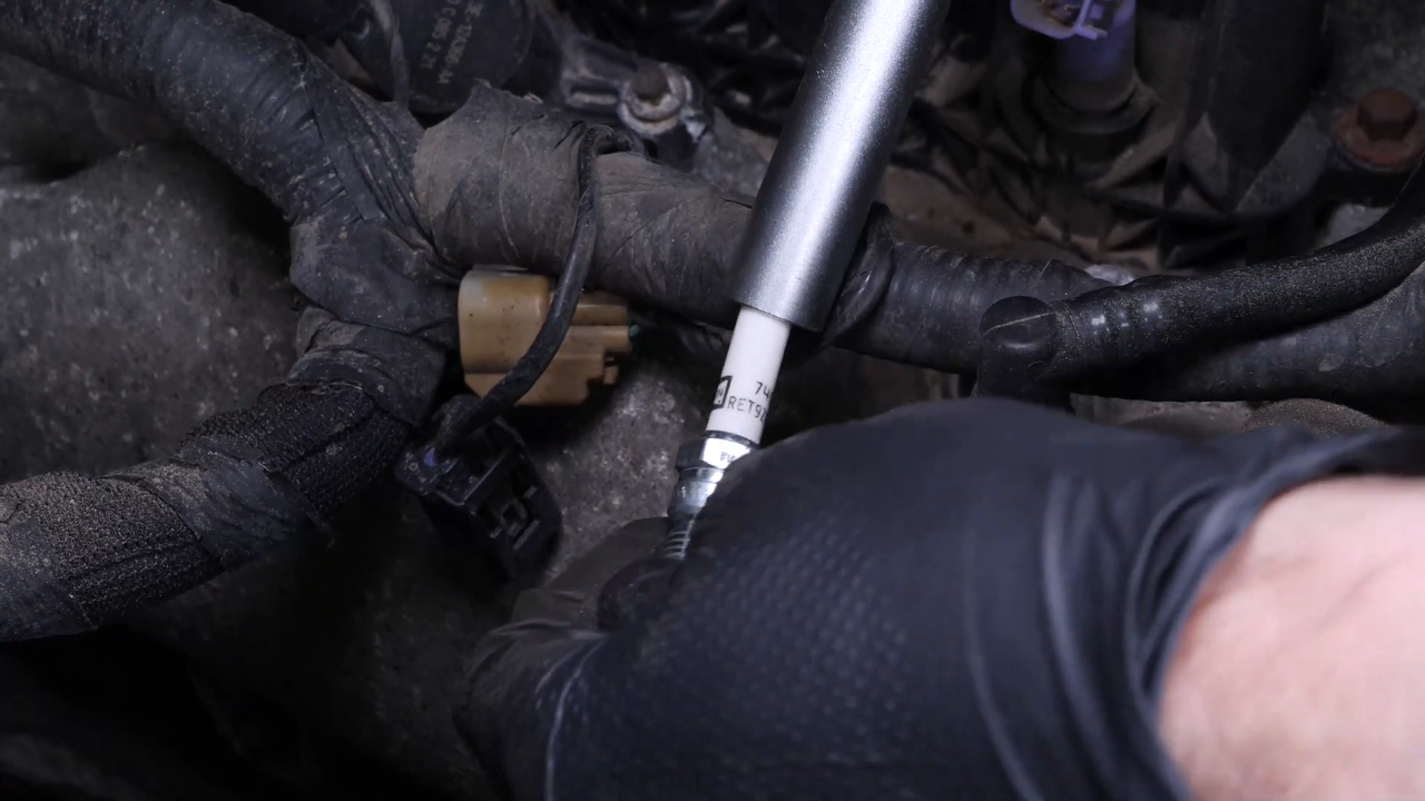 Install the new spark plugs