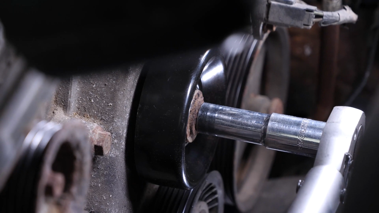 Install the idler pulley