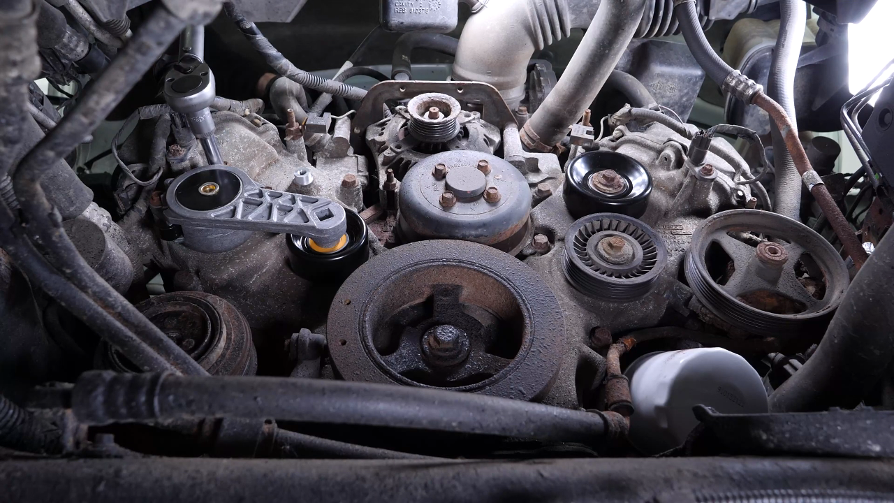 Install the new tensioner pulley