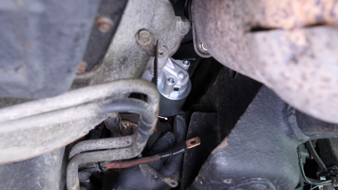 Tighten the bolts holding the starter