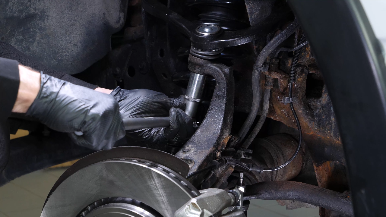 Remove the control arm ball joint