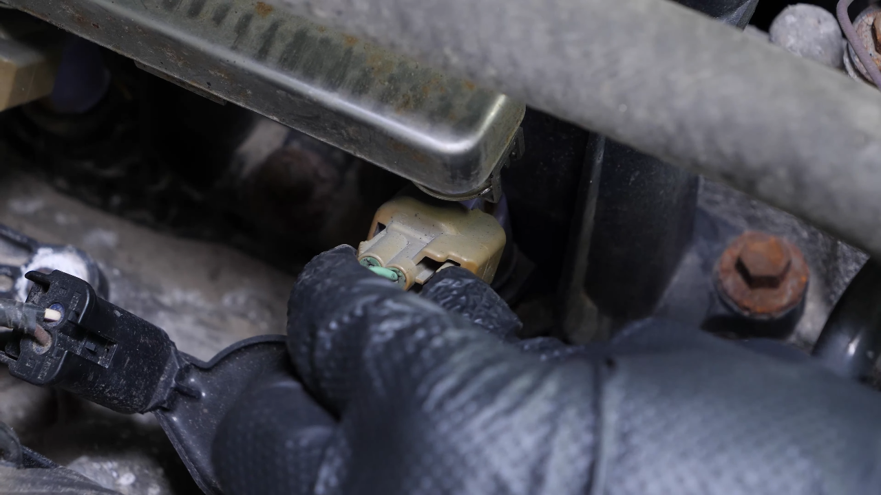 Disconnect the fuel injector
