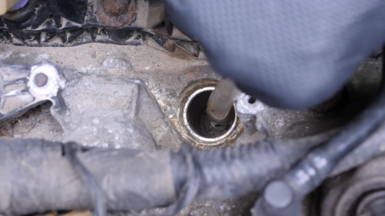 Clean around the spark plug