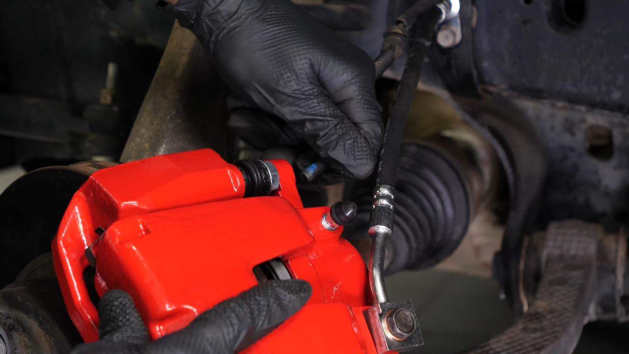 Remove the brake caliper