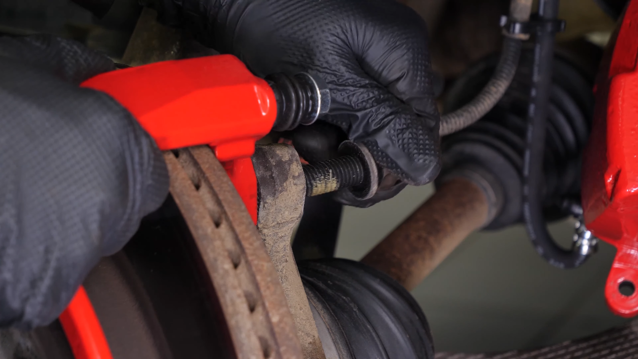 Remove the  brake caliper mount
