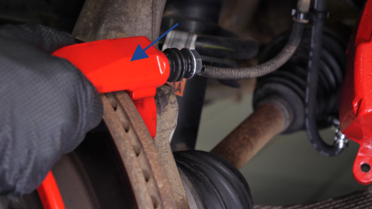 Remove the  brake caliper mount