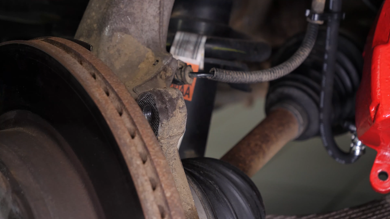 Remove the  brake caliper mount