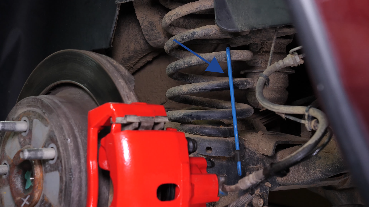 Remove the brake caliper