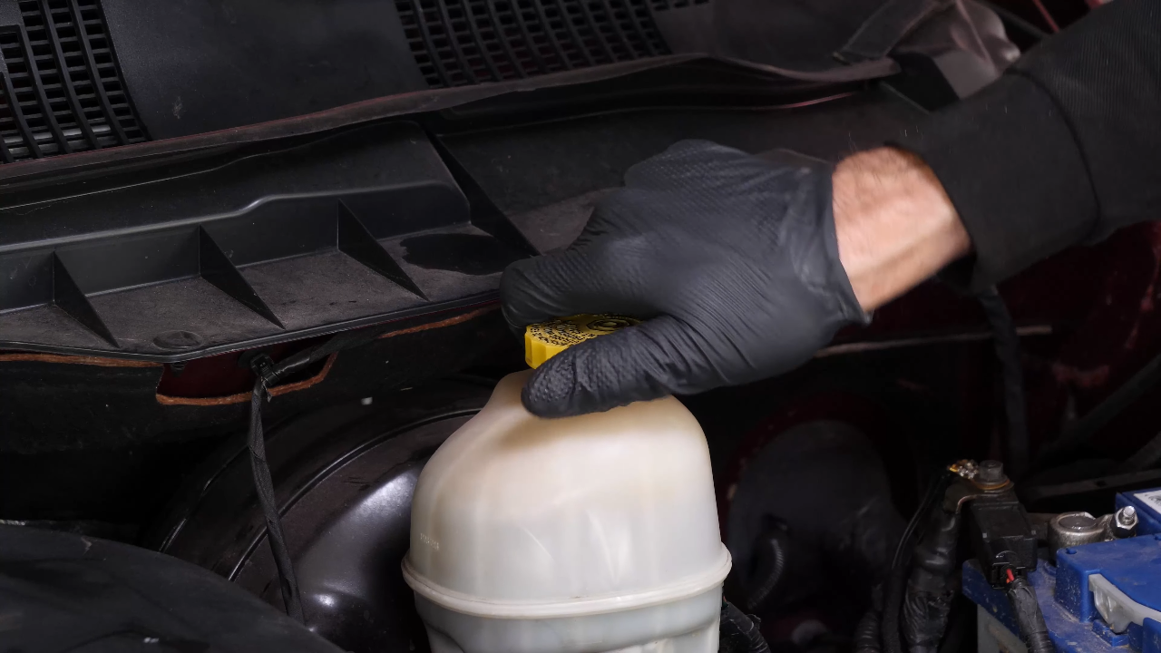 Open the brake fluid reservoir