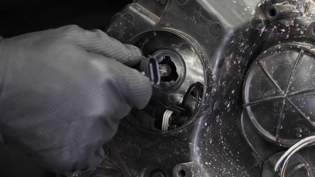 Replace the low beam bulb